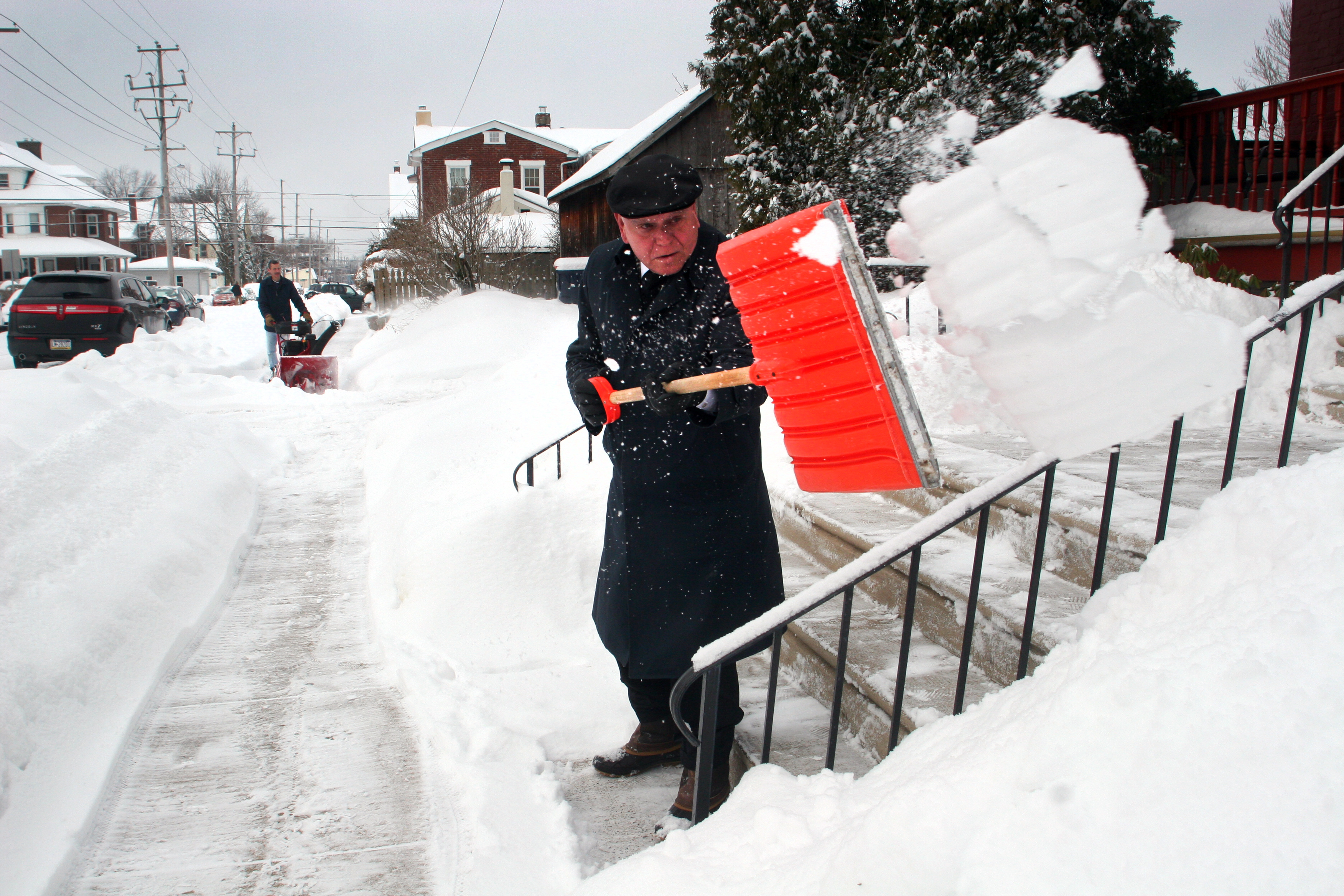 Man Shoveling Snow